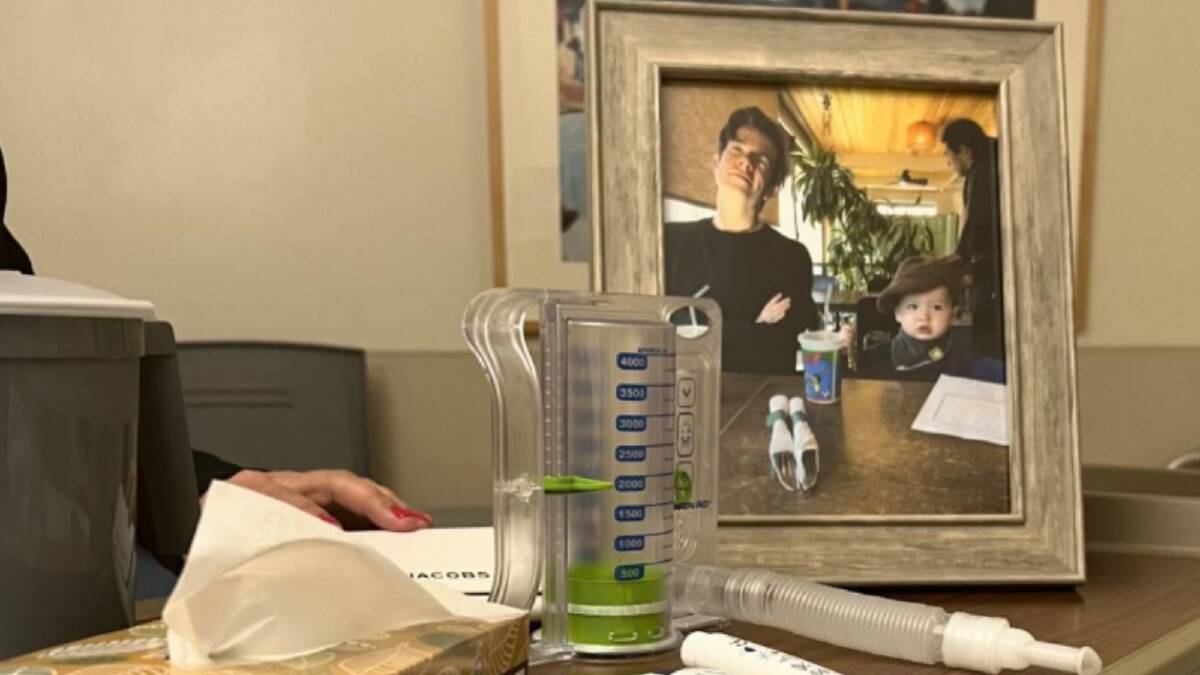 A framed photo of partner John Mulaney and child Malcolm on Ms Munn's bedside table. Picture Instagram/Olivia Munn