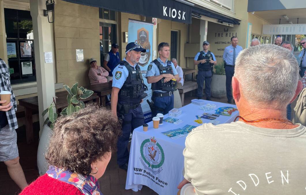 Sergeant Ben Walsh, pictured left, and Senior Constable Nathan Perretta from the Lake Illawarra Police District spoke to Gerringong locals. Picture by Joel Ehsman