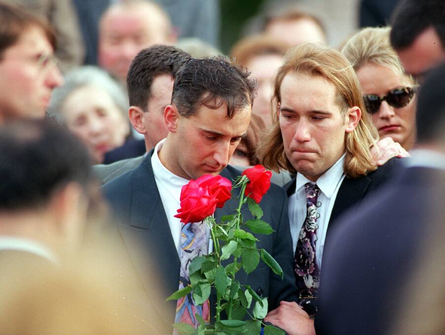 Walter Mikac (left) mourns his late wife Nanette and daughters Alannah and Madeline.