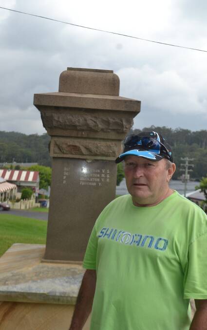 ANGRY COMMUNITY: Nelligen Progress Association member Paul Blanch fears that the vandalised Nelligen Cenotaph may not be restored to its former state. 