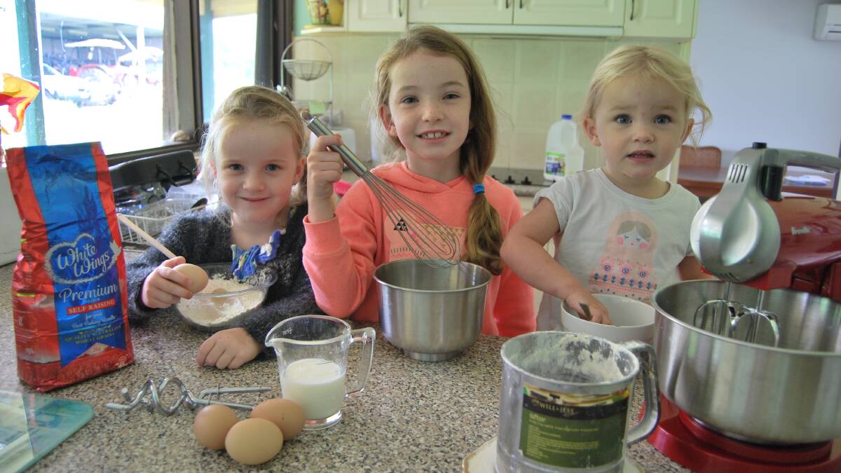 Kitchen Wizz: Isla, Jahmalia and Lucia Downes are busy in the kitchen brushing up on their cooking in preparation for the 2016 Kiama Show.