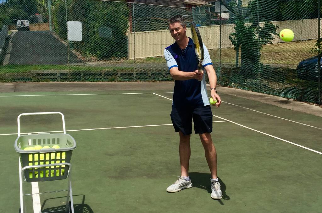 Tennis coach heads home to his childhood court