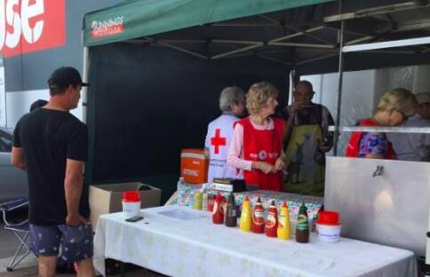 Kiama Red Cross volunteers enjoy their time at the Bunnings BBQ, Shellharbour. 