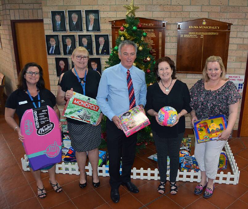 Kiama Council general manager Michael Forsyth and council staff with their gifts for the 2017 Giving Tree.