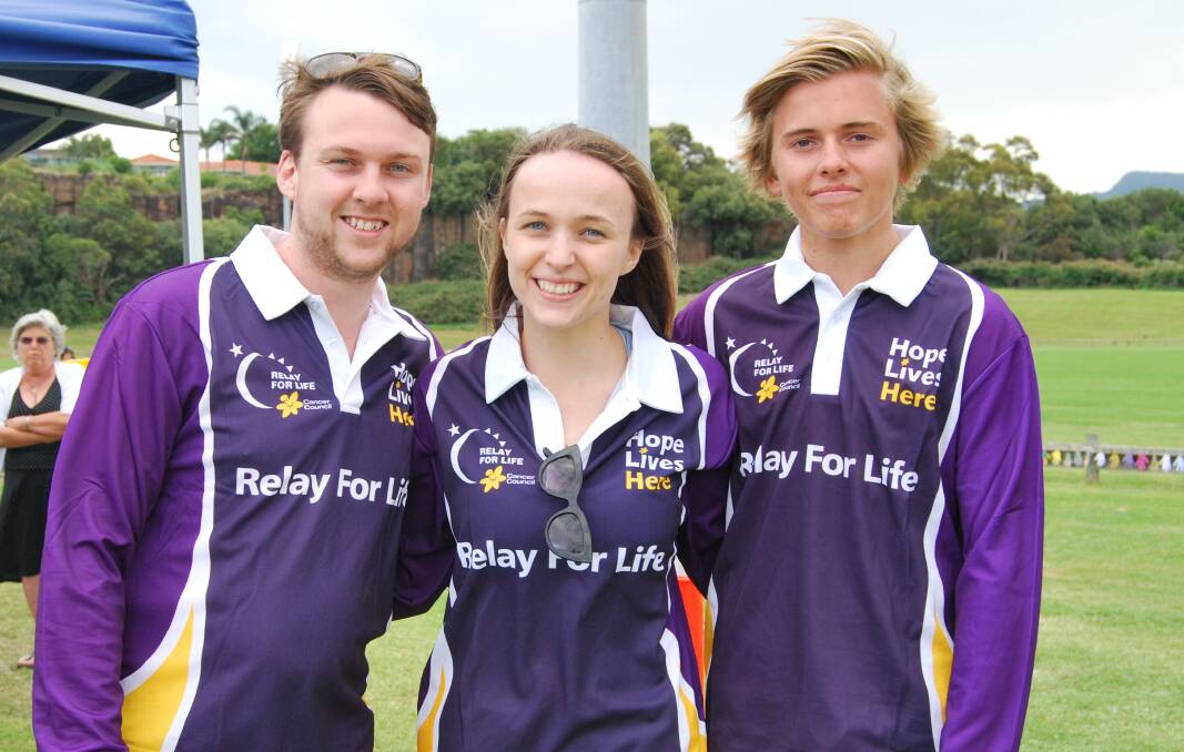 Gwilym, Eluned and Matthew Price donned their purple shirts to help raise vital funds.