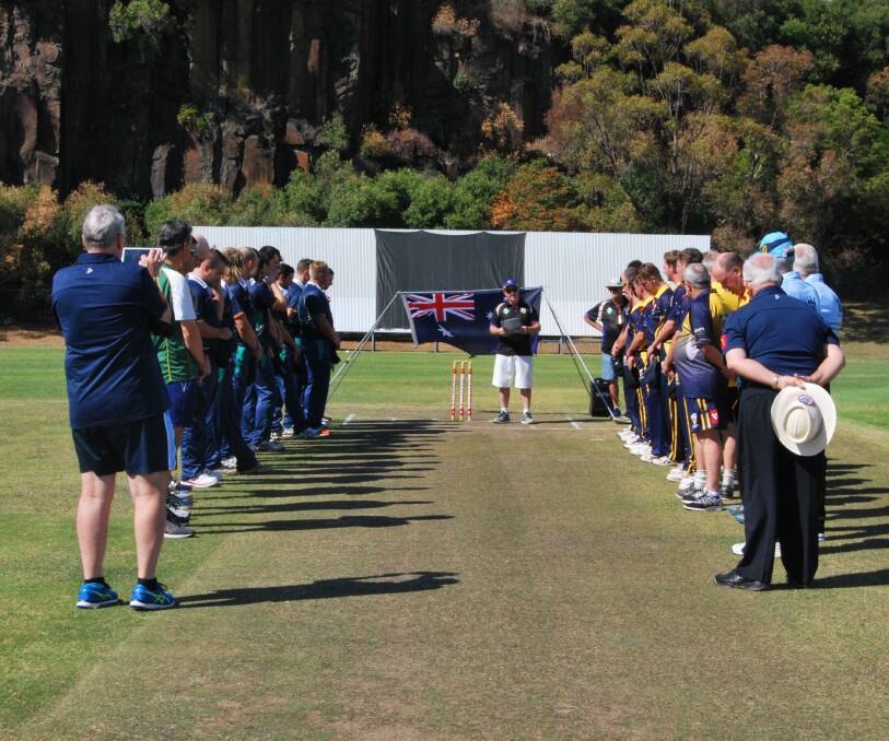 UNITED: Kiama Cricket Club's Brendan Barr leads the Remembrance Day ceremony before Riverina and Central Coast contest the NSW Country Championships at Kiama on Saturday.