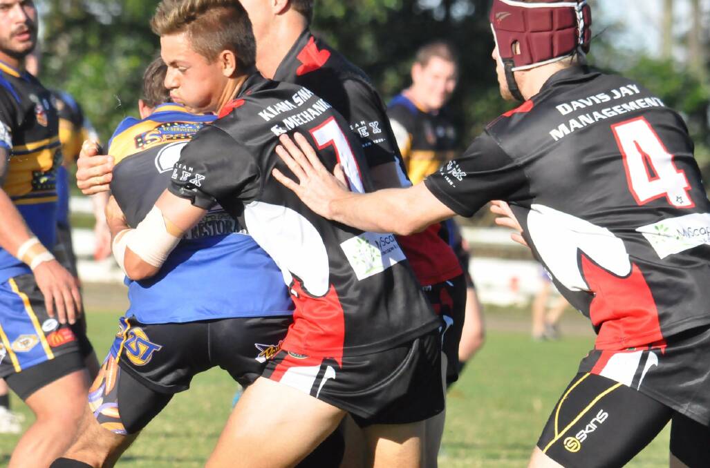 STRONG DEFENCE: Cameron Vazzoler defends for the Kiama Knights against the Nowra/Bomaderry Jets on Saturday.