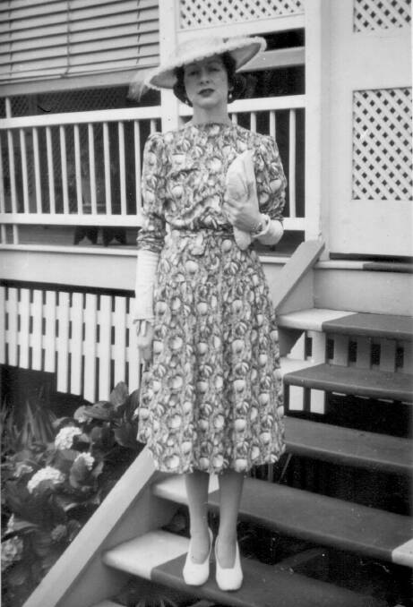 Mavis' first day at work as a typist at the solicitor's office - this photo was taken on the front steps of her parents' Indooroopilly home.