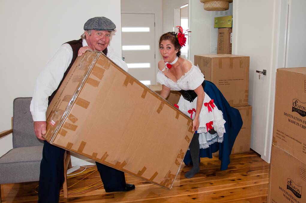 Neil Reilly and Rachel Piggott try to be helpful at the Carers Cottage.