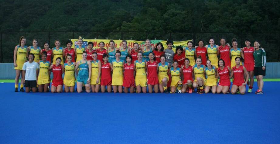 The Australian women’s development squad with the Coca-Cola Red Sparks.