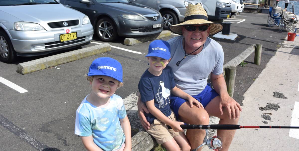 Joshua, Lachlan and Craig Sail taking part in the Children's Fishing Charity Competition at Kiama Harbour on January 8. 