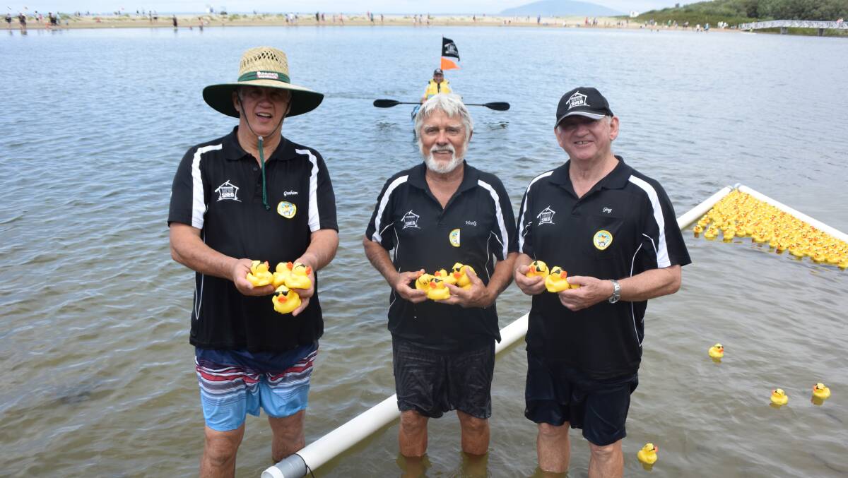 RAISING FUNDS: Graham St Clair, Jim Woodlands and Greg Goddard from the Gerringong Mens Shed at the Duck Derby. 