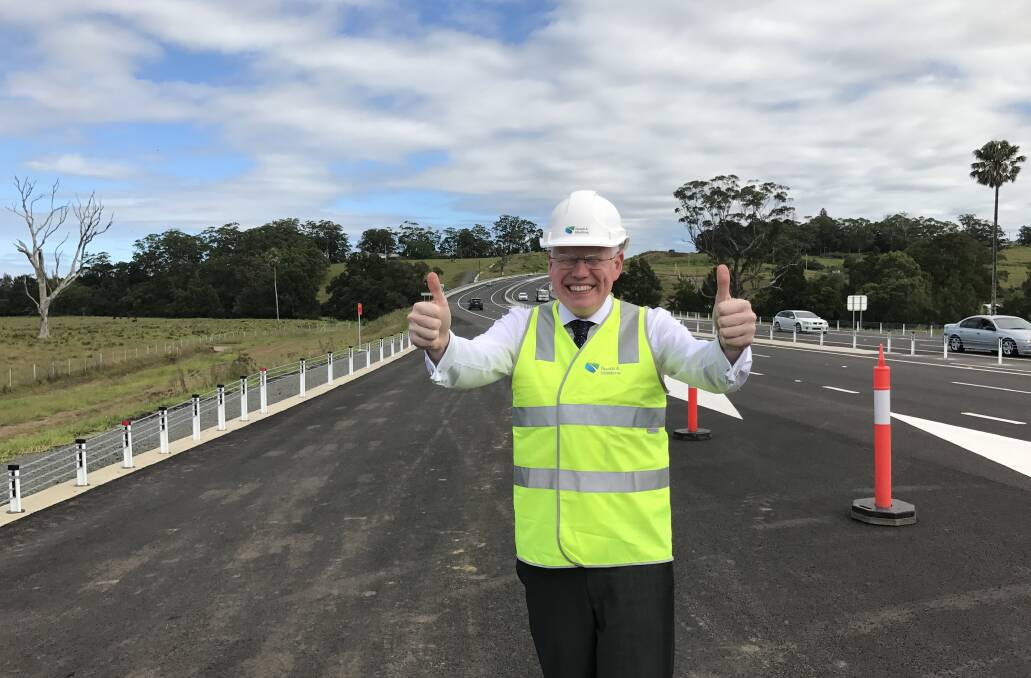 Gareth Ward celebrates the opening of the Foxground bypass.