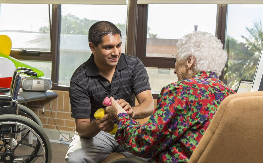 great job: A physiotherapist in aged care - a traditionally female-dominated industry - Shiva Gopalan says he is keen to change the perceptions of the job. Picture: Supplied 