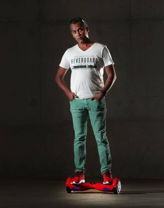 Hoo-ha: Dinesh Mascarenhas says hoverboards are fun, easy to use and can be used safely on all sorts of surfaces including grass. Picture: Adam McLean