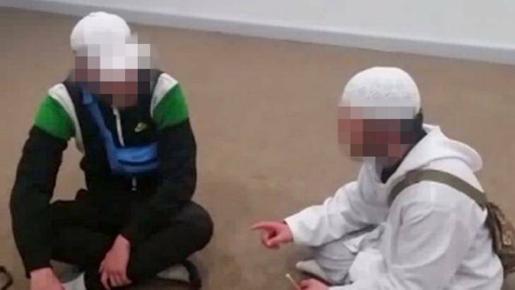 One of the boys, in white, uploaded videos of him converting other young people to Islam. Photo: Facebook
