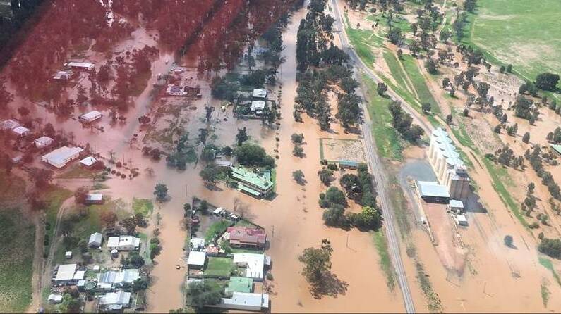 OVERFLOW: Residents in the village of Beckom have been isolated by the Mirrool Creek bursting its banks after Wednesday's deluge. Picture: SES