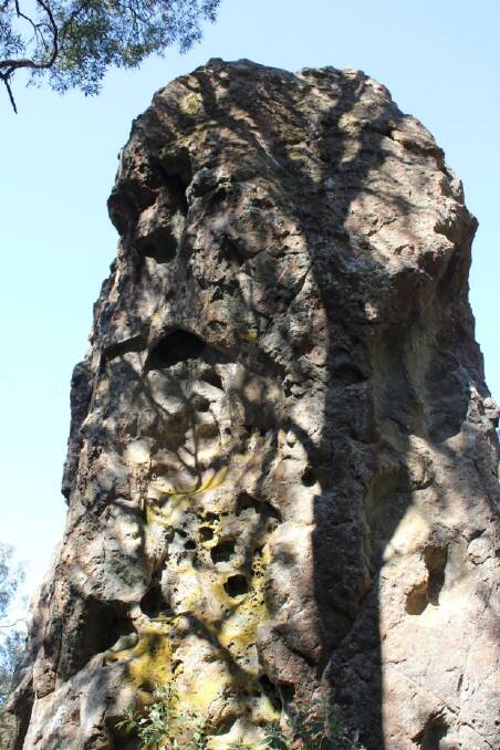 From this angle, there appears to be a mysterious face carved into Hanging Rock. Photo: Courtesy of The National Trust