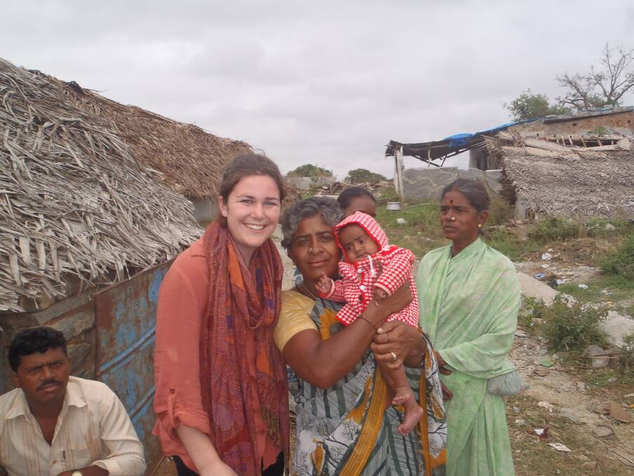 REACH OUT: Kimberley Abbott in India, with some of the women from the Bangalore quarries.