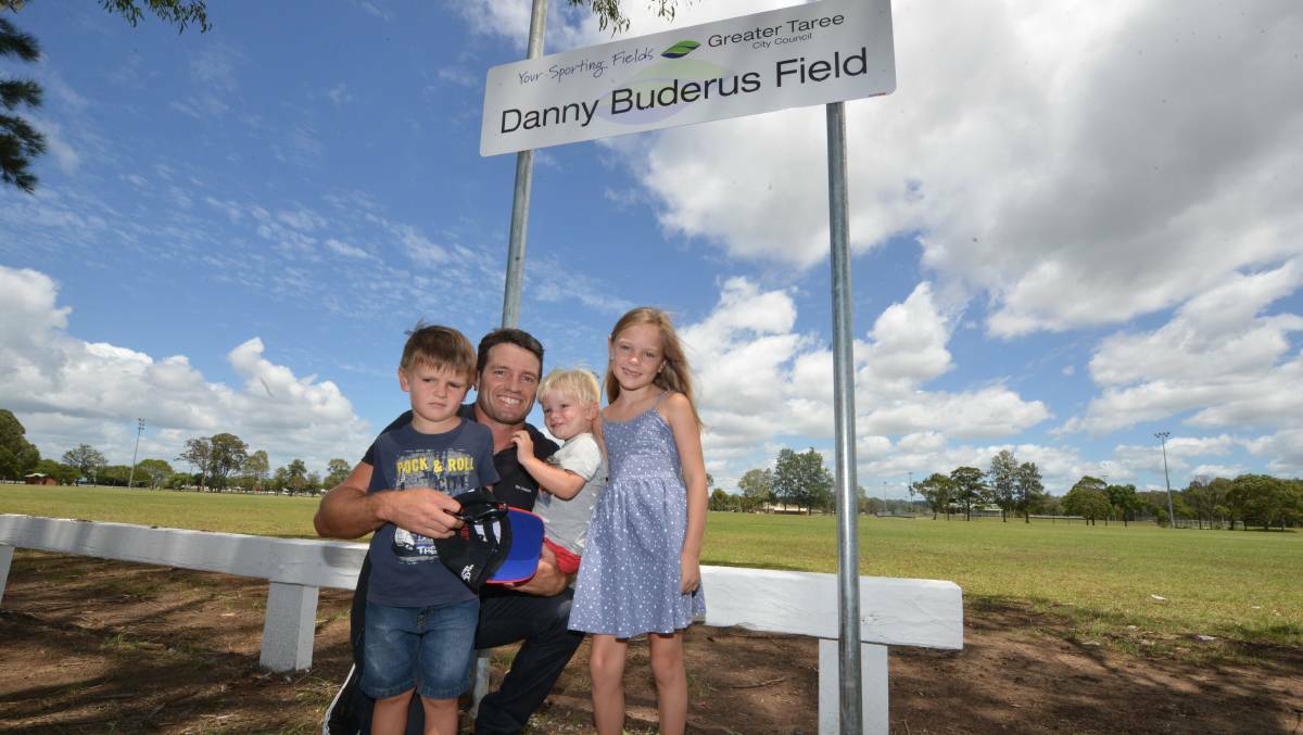 Greater Taree City Council decided to name one of the rugby league fields at Taree Recreation Centre in honour of Danny Buderus. Danny is pictured at the official function with his children, Lachie, Jack and Ella.