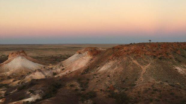 The sun sets at The Breakaways, just outside of the Coober Pedy’s town centre. Photo: Kirsten Robb