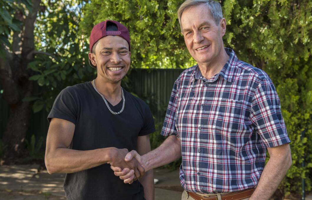 NEW HOME: Jamil Mohammed from Burma - one of about 80 SHEV holders already living and working in Tamworth - with Multicultural Tamworth vice-president Brian Lincoln. Photo: Peter Hardin