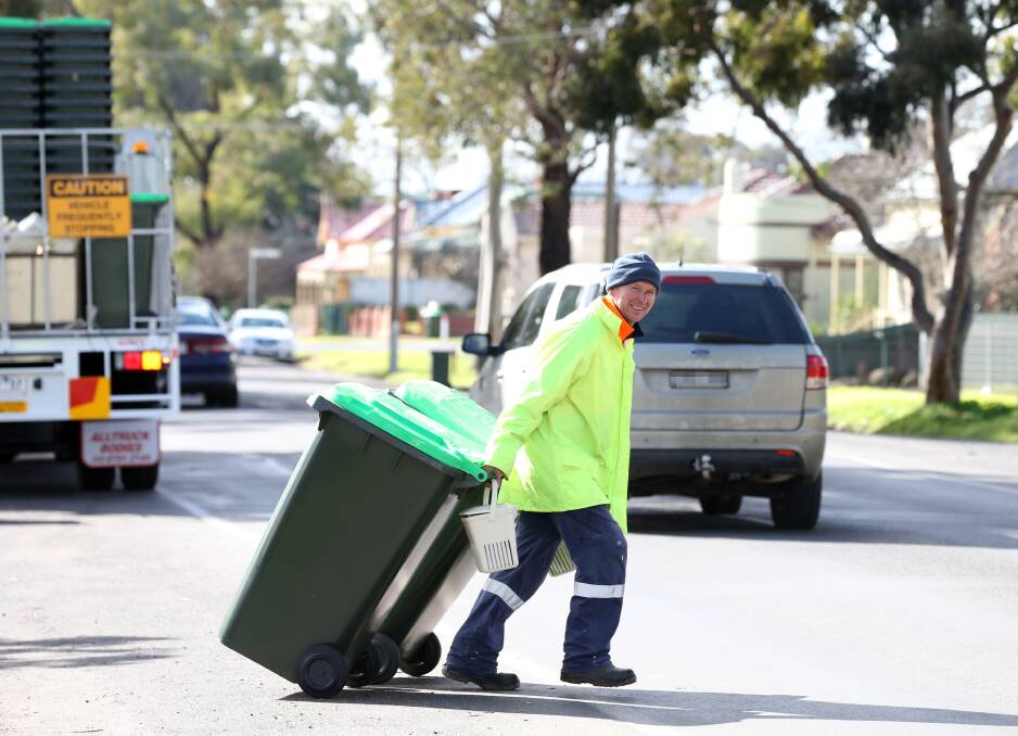 ROLL OUT: The City of Greater Bendigo started rolling out its new organic bins today. Picture: GLENN DANIELS
