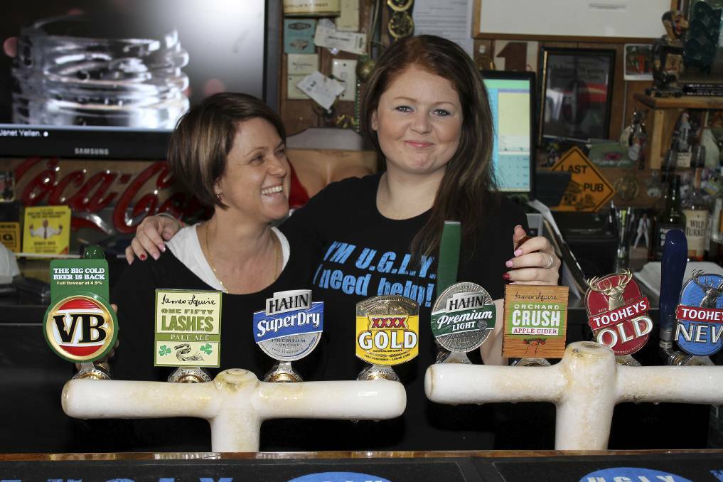 Former Jamberoo Hotel licensee Erica Warren and UGLY Bartender entrant Alicia Doolan at the hotel in 2013. Picture: DAVID HALL
