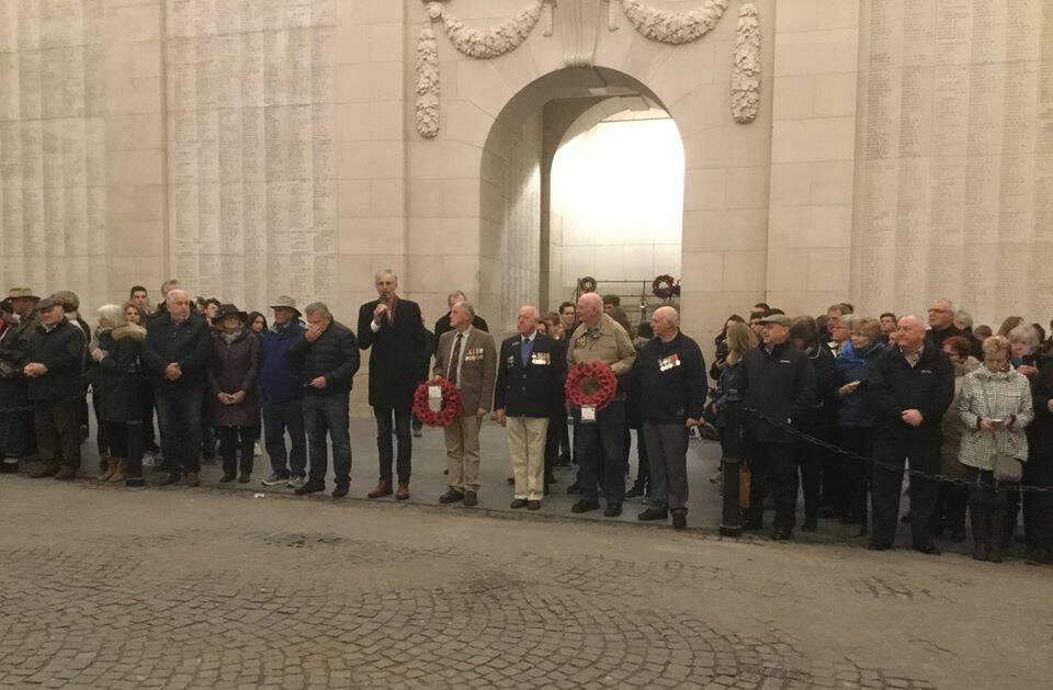 Wes Hindmarsh, Don Parkinson and Brian Kenny prepare to lay wreaths at Menin Gate.