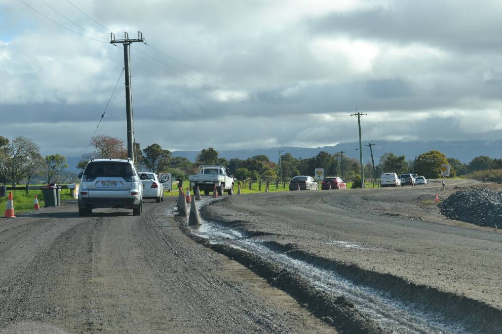 TAKE CARE: Motorists negotiate parts of Greenwell Point Road east of Nowra, which Shoalhaven City Council and RMS is upgrading. Photo: Adam Wright