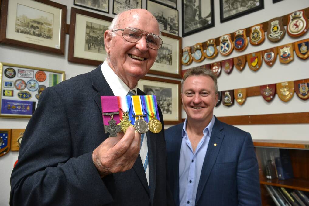 HISTORIC TOUR: Nowra man Brian Kenny, proudly shows off his uncle Bede Kenny’s medals, including a replica Victoria Cross, he will take on a tour of the Western Front later this month led by Nowra RSL Sub-Branch secretary Rick Meehan.