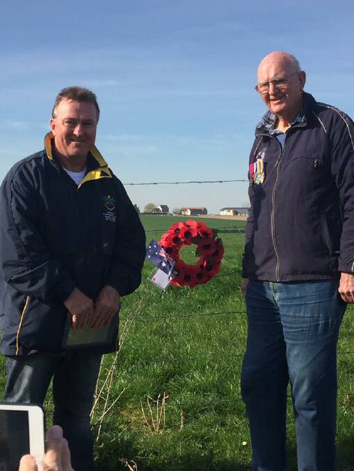 Rick Meehan and Brian Kenny lay a wreath when Mr Kenny's uncle Bede was awarded the Victoria Cross.
