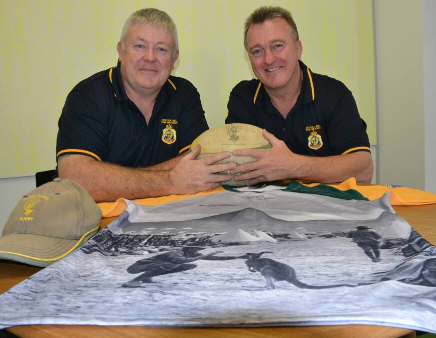 STALWARTS: Digger Day and Nowra RSL vice-chairman Fred Campbell (left) and Digger Day chairman and Nowra RSL secretary Rick Meehan with this year’s Shoals’ jersey.
