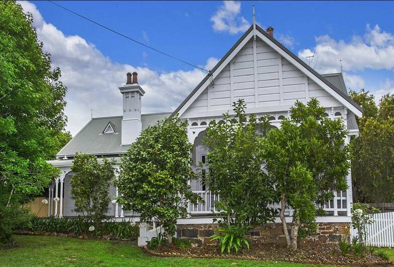 Architect John Simmons - known for his Gothic Revival style - built 157 Manning Street in Kiama (pictured) along with many other private and public buildings around the region. Picture: Ray White