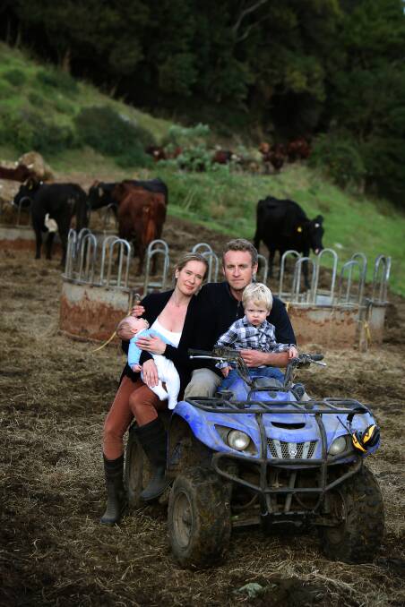 Owners of Waterside Dairy Farm in Jamberoo, the Downes family. Fourth generation farmer Steven Downes with his wife Erica and kids Arthur and Leo. Picture: Sylvia Liber