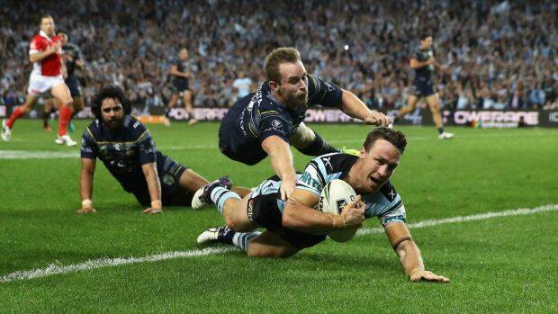 Signed, sealed, delivered: James Maloney's intercept capped off a magic night for Cronulla. Photo: Getty Images