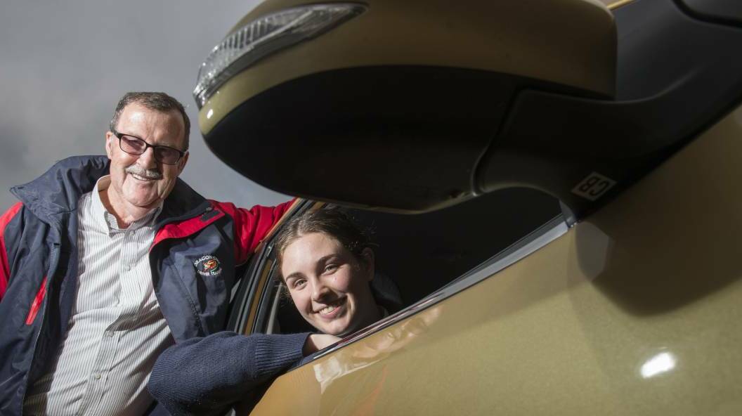 CAR CARE: Driving instructor Greg Penno prepares 17-year-old Zoe Ferns for her driver's licence exam. Picture: DARREN HOWE