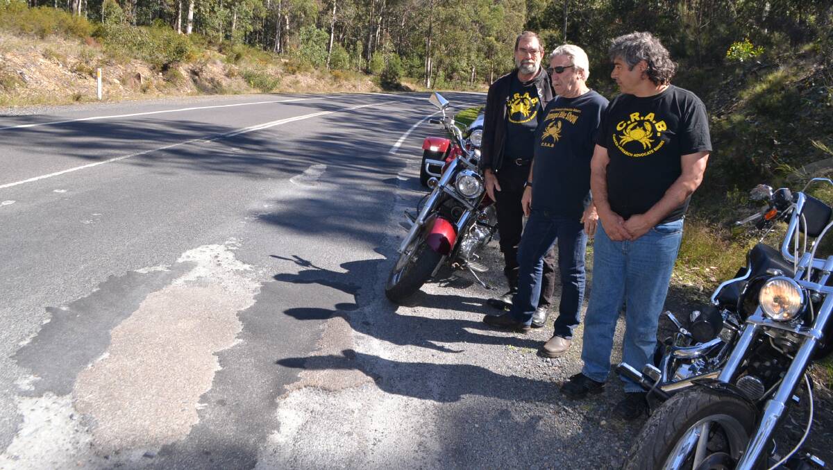 Before Sunday's charity duck race CRABs members Murray Gibbs, Jim Gilchrist and Stuart Willenberg at the dangerous spot at the entrance to Bermagui. 