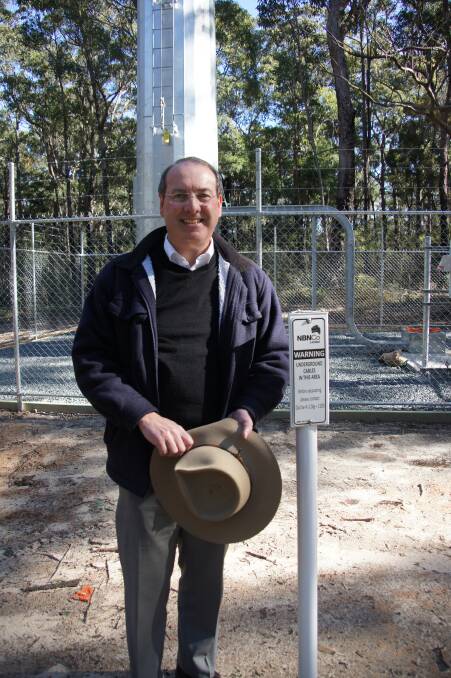 MASTER TOWER: Dr Peter Hendy at the now complete Bermagui master NBN tower that will service area north to Narooma. 