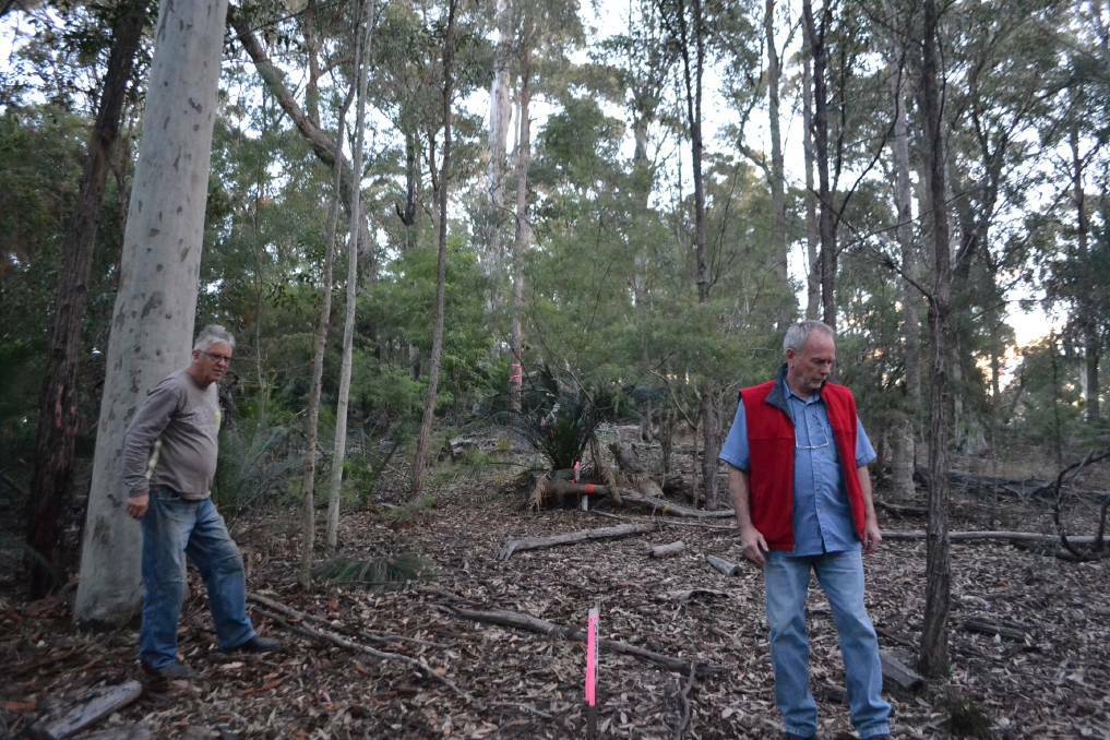 Mystery Bay resident Richard Nipperess and Brushgrove Lane resident John Ramsay on the site where NBN Co is now building the Brushgrove Lane fixed wireless tower in the middle of bushland.  