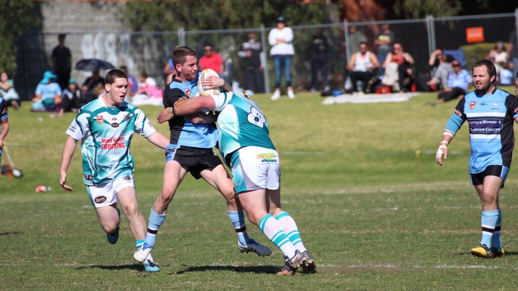 Moruya's Jack Keating, pictured in a tackle during last year's grand final, scored against CBU on Saturday. Picture: Andrew Jones. 