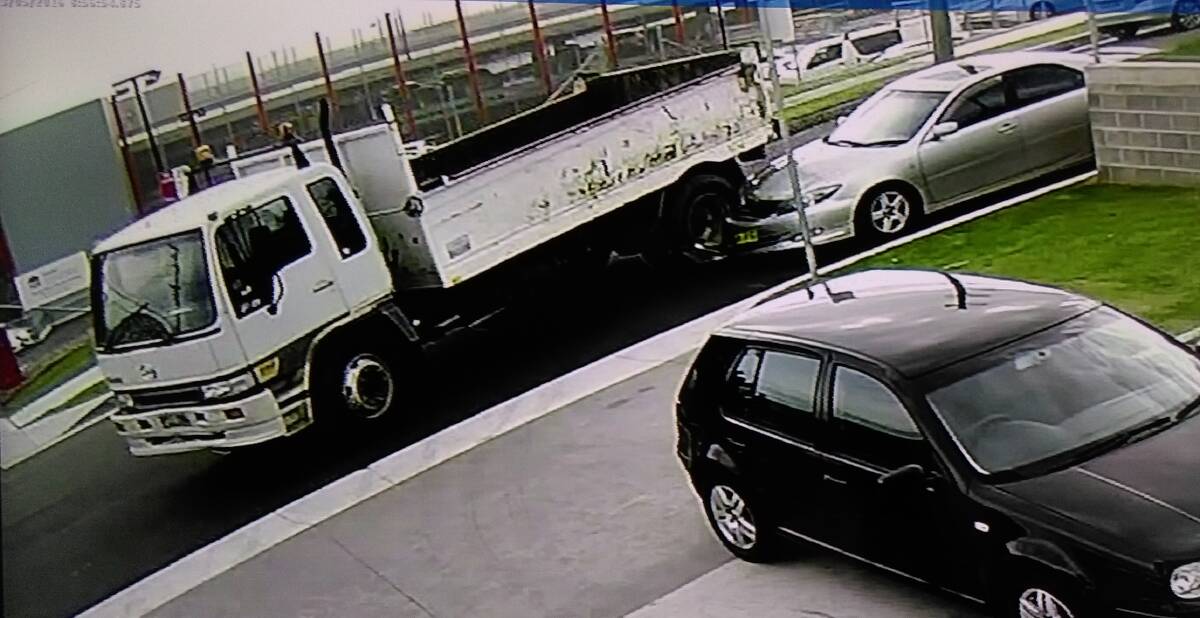 IMPACT: An image taken from CCTV cameras shows the truck making contact with the car. Picture: supplied