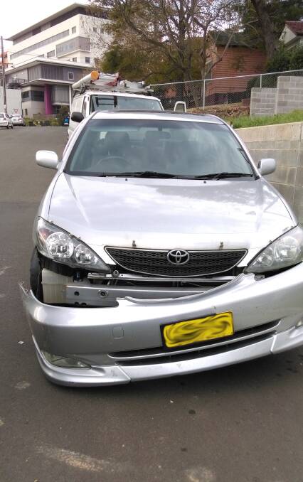 NO NOTE: The car's front end was left hanging on the road. Picture: supplied