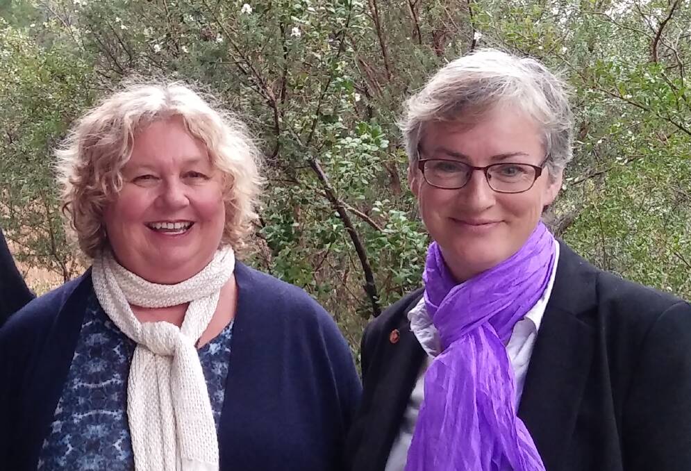 PERSUASIVE PETITION: Annie Boutland with Councillor Amanda Findley. Ms Boutland says illegal tree lopping for a better ocean view occurs at Bushcare sites she maintains in Ulladulla.
