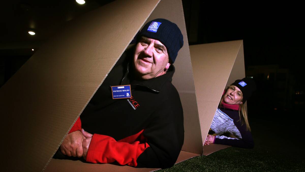 ROUGHING IT:  Patrick Walsh and Sherie Avalos during the 2016 Vinnies CEO Sleepout in Wollongong. A launch dinner will be held on April 7. Picture: Sylvia Liber