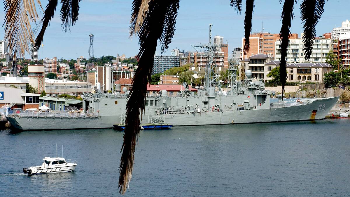 The Australian frigate HMAS Sydney at Garden Island - a NSW Government report doesn't look to move part of the navy's operations to Port Kembla. Picture: James D Morgan
