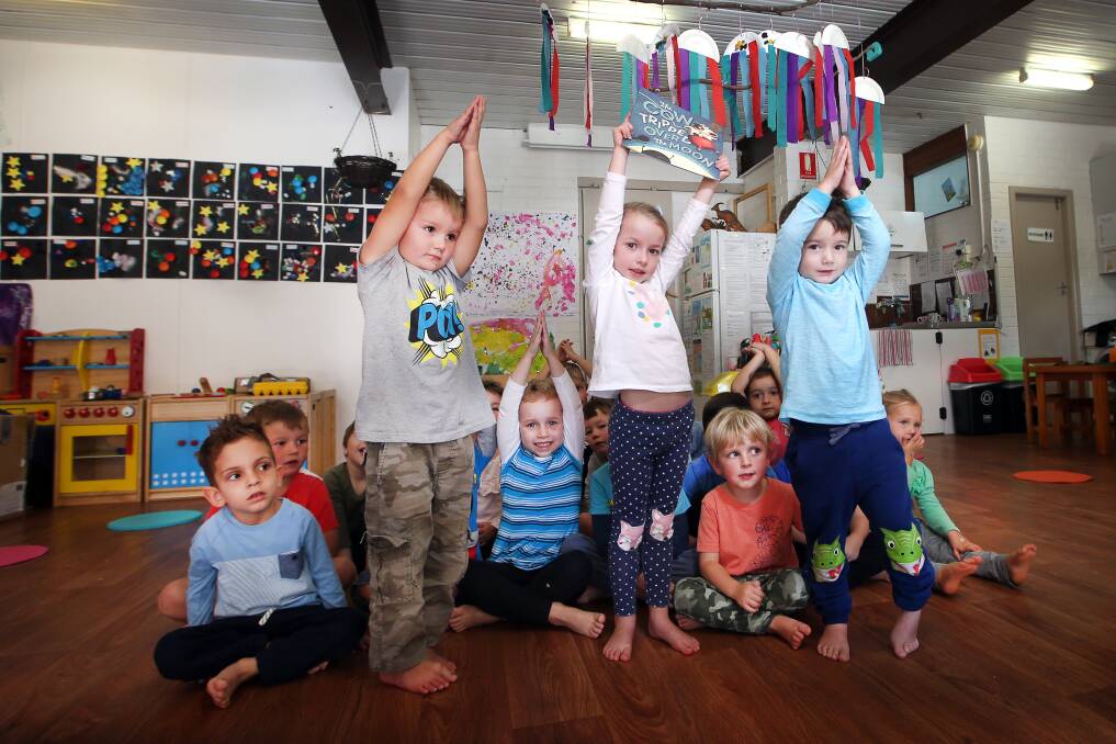Kindy Korner preschoolers did a special yoga class as part of the National Simultaneous Storytime initiative on Wednesday. Picture: Sylvia Liber