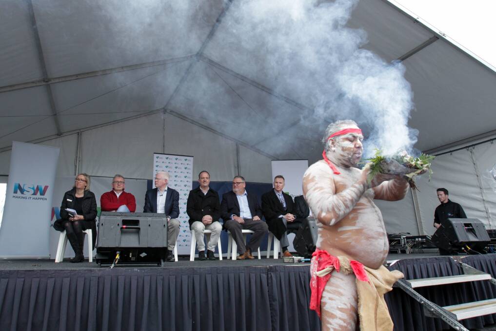 Joe Brown-McLeod, from the ​Yuin Nation people, performing a smoking ceremony ahead of the opening of the Berry bypass. Pictures:  Adam McLean