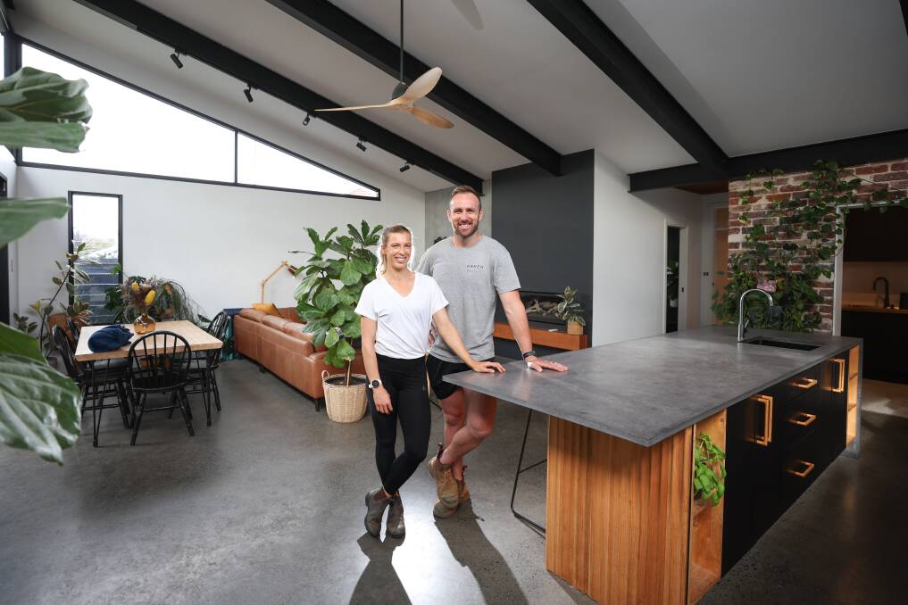 Anneleise Carratt and Jarrod Thompson in their sustainable home. Picture by Adam McLean