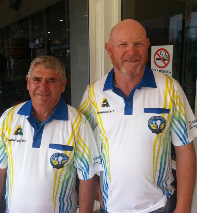 Dougie Downton and Tommy Hodgson show off the new club colours.